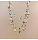 Colar Pulseira Feminino com Concha e Cristal Azul – Aço e Zircônia